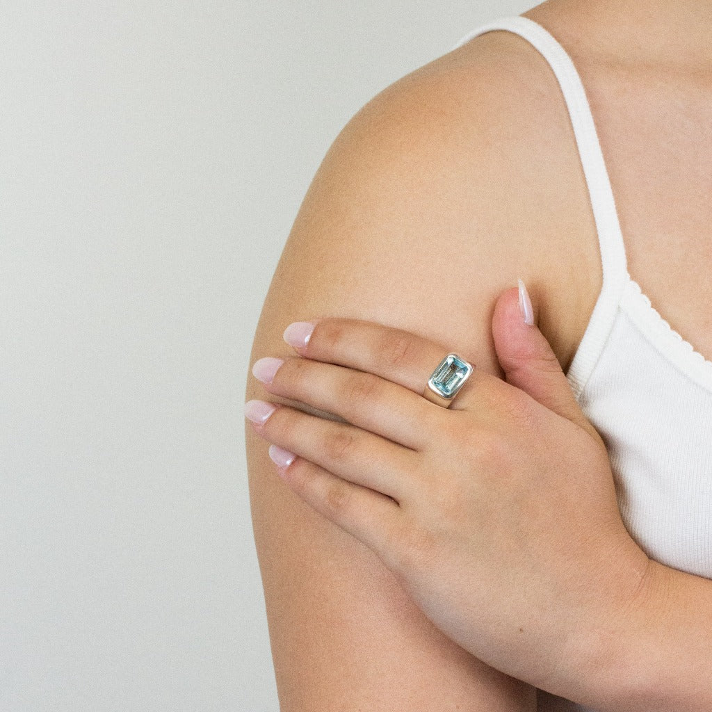 Blue Topaz ring on model