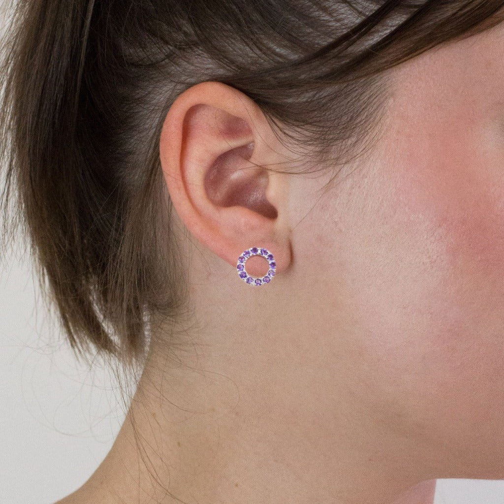 Amethyst stud earrings on model