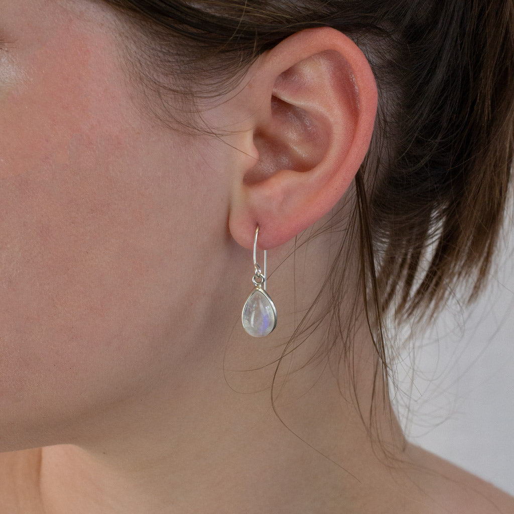 Rainbow Moonstone drop earrings on model
