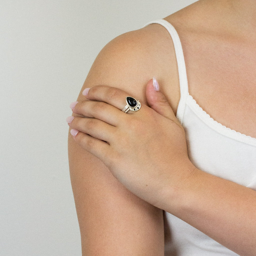 Onyx and Black Diamond ring on model