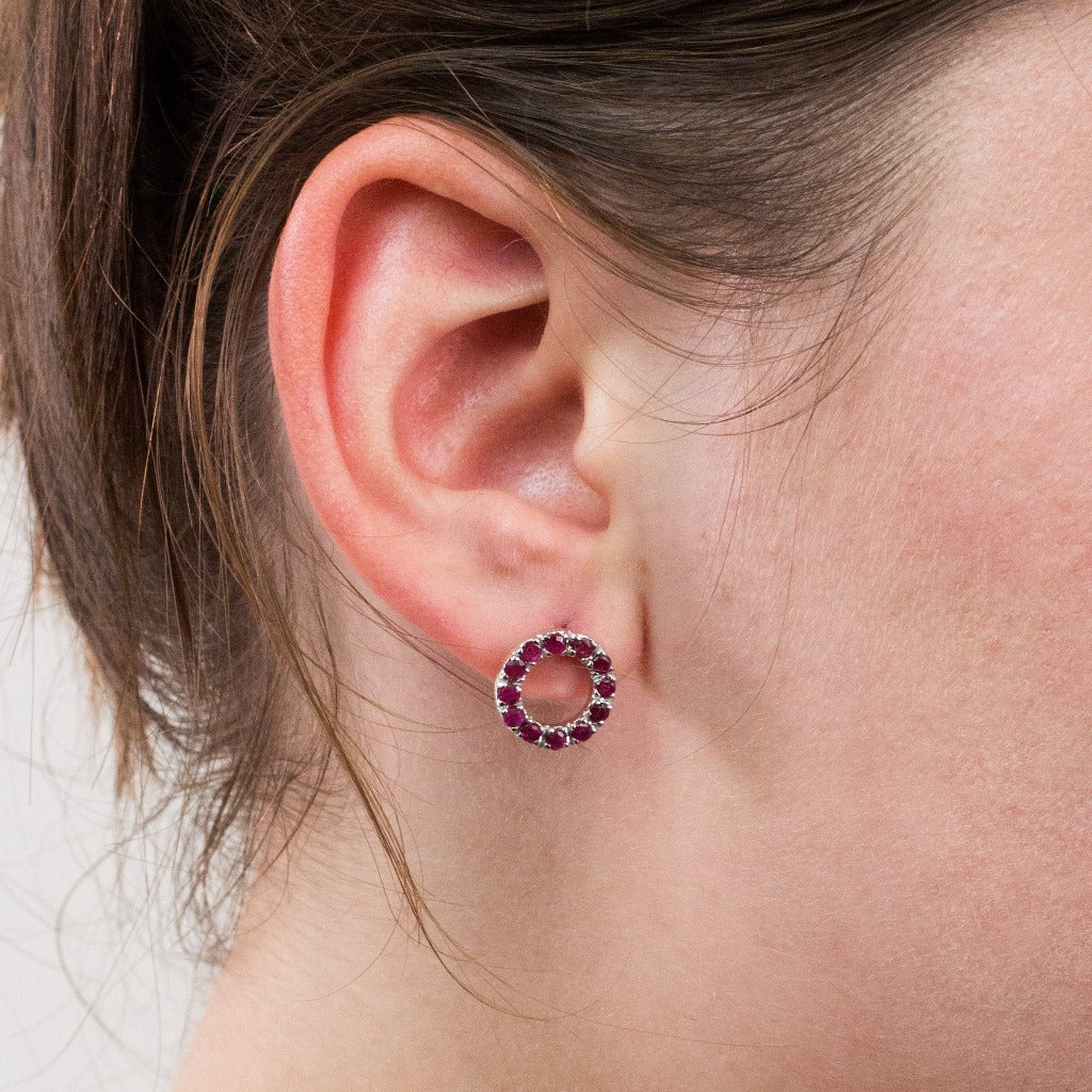 Ruby stud earrings on model