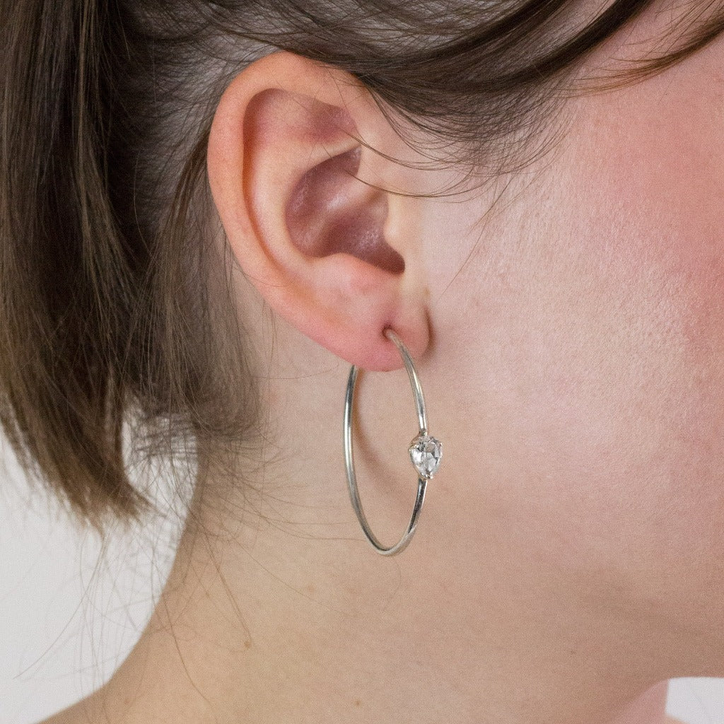 Clear Quartz hoops on model