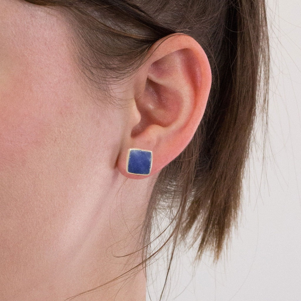 Sapphire stud earrings on model