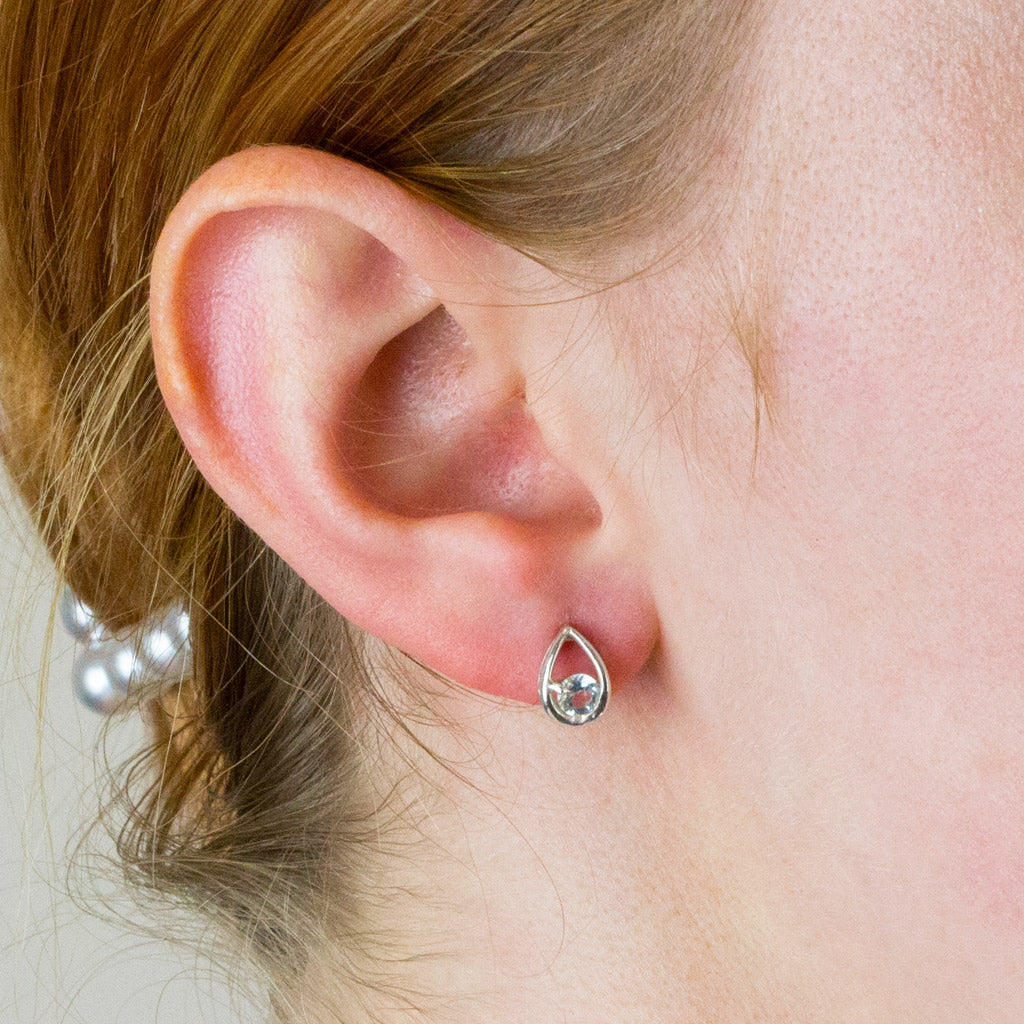 BLUE TOPAZ STUDS on model