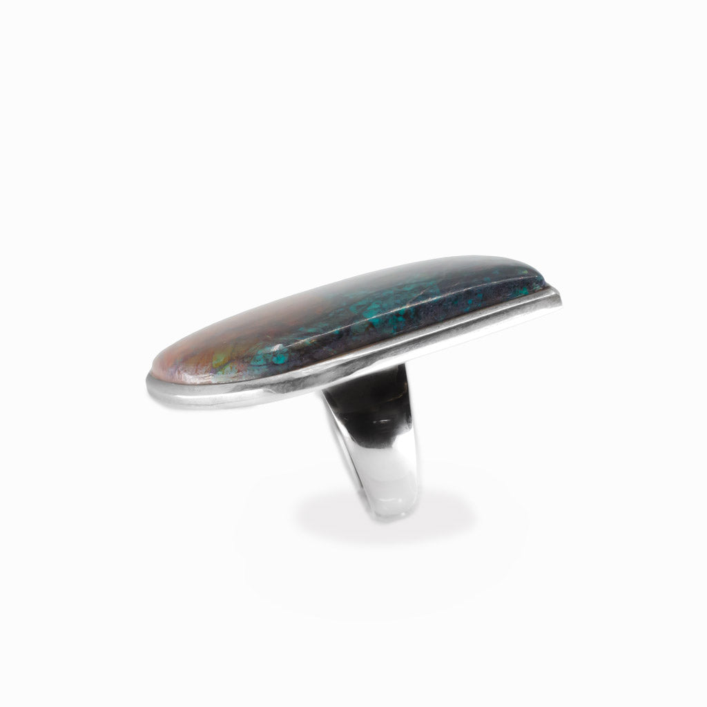 Chrysocolla Cuprite freeform cabochon ring in polished sterling silver with vivid teal blue, turquoise and warm copper mineral patterns.