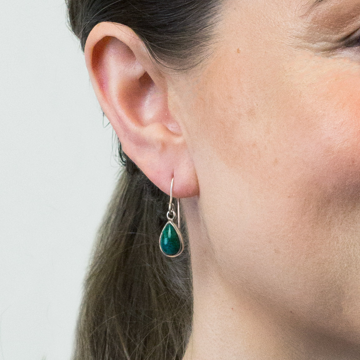 CHRYSOCOLLA TEAR DROP EARRINGS ON MODEL