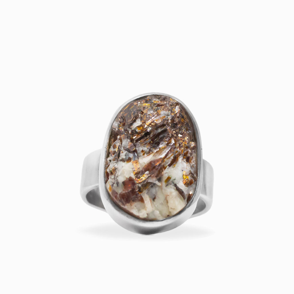 Freeform oval Astrophyllite ring with bronze, cream and metallic formations set in polished 925 sterling silver.