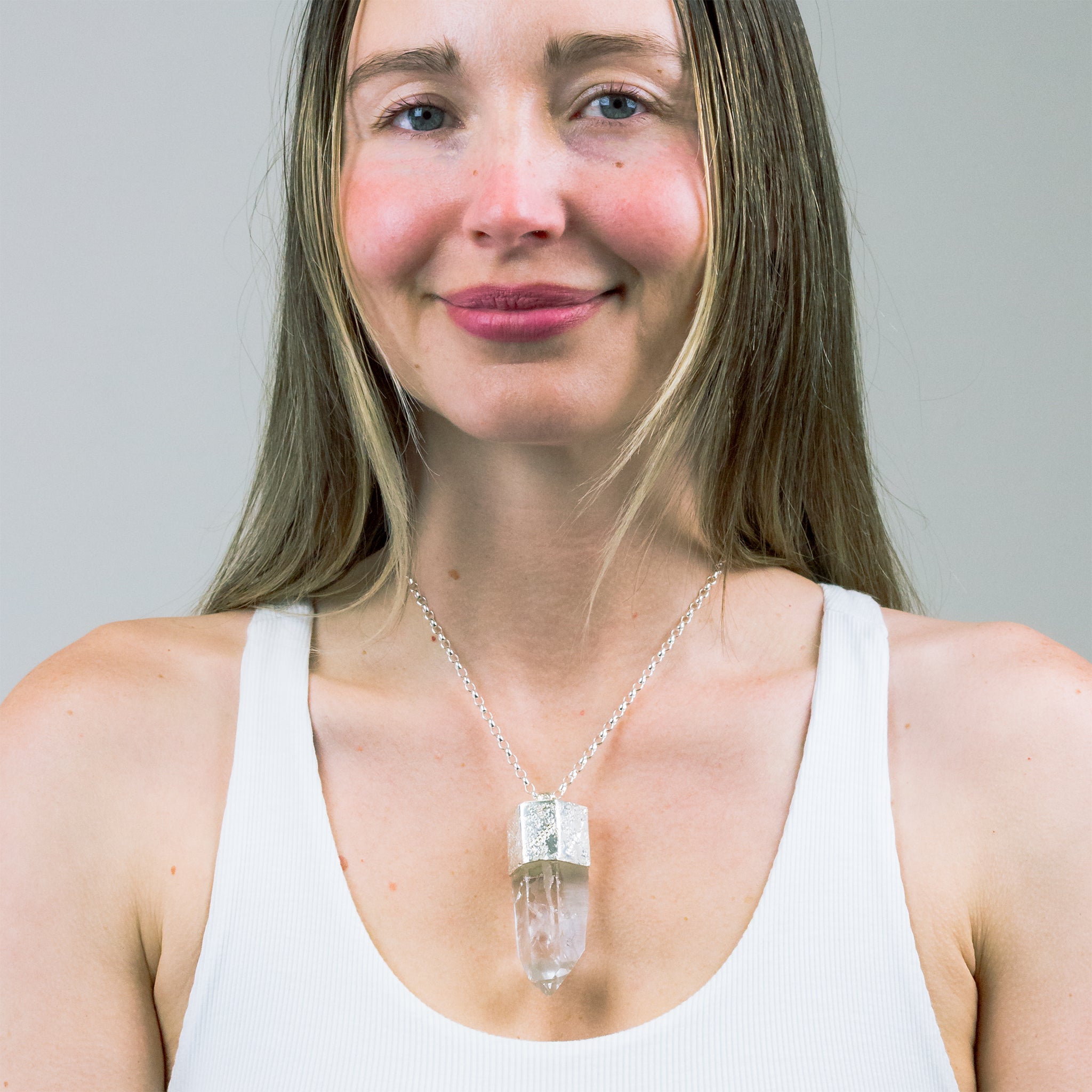 RAW PENCIL CLEAR QUARTZ NECKLACE ON MODEL