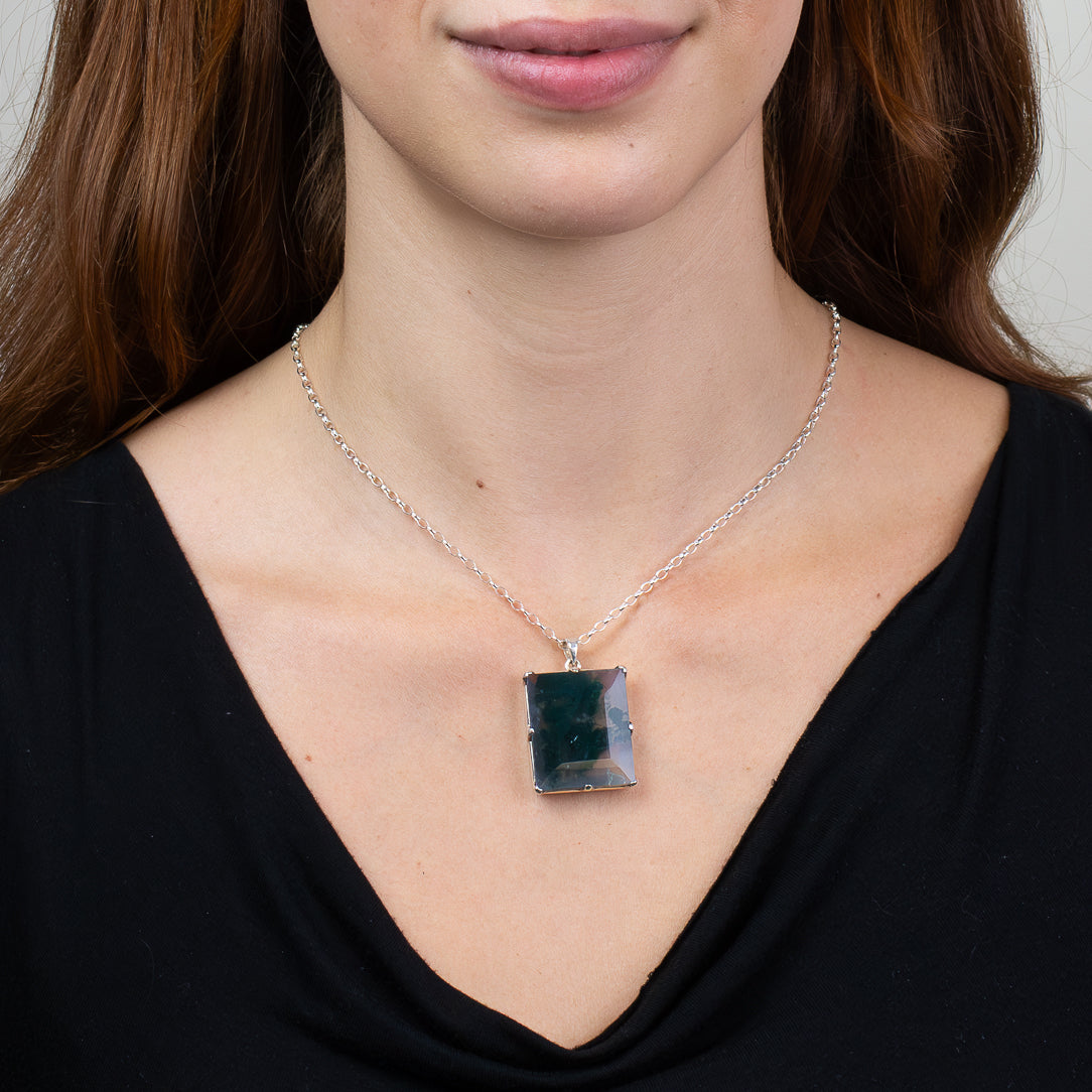 Faceted rectangular Moss Agate pendant necklace in sterling silver with natural green botanical-like inclusions. ON MODEL