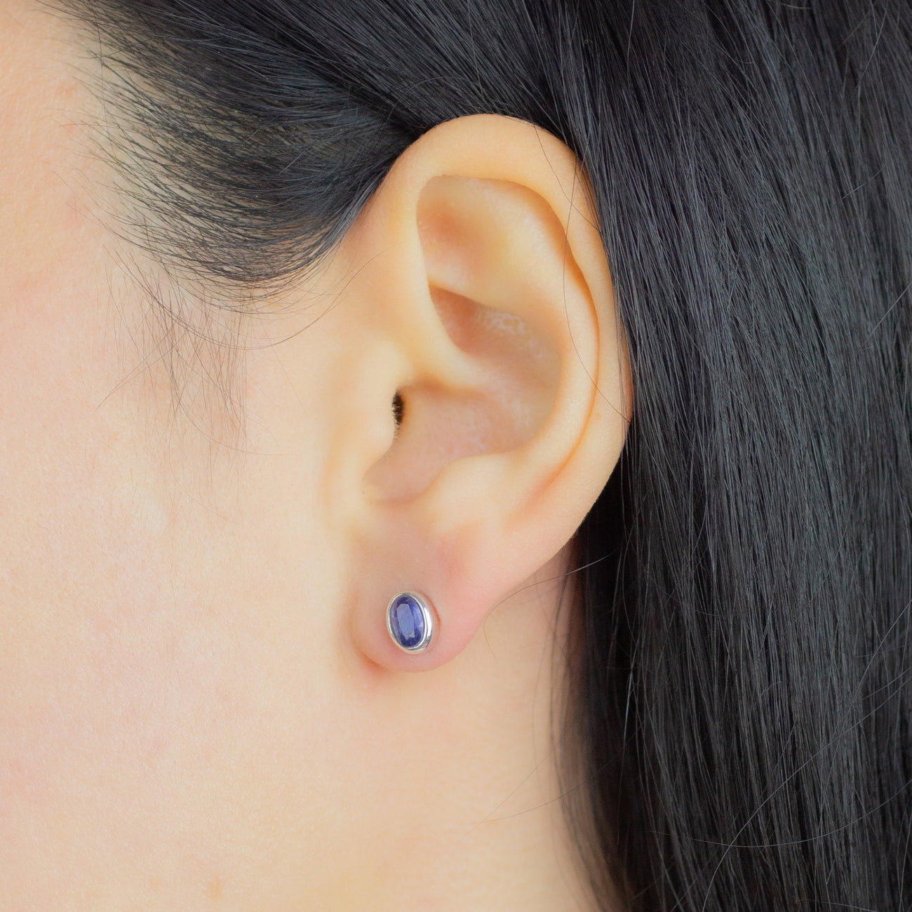 FACETED BLUE KYANITE STUD EARRINGS STERLING SILVER ON MODEL | MADE IN EARTH