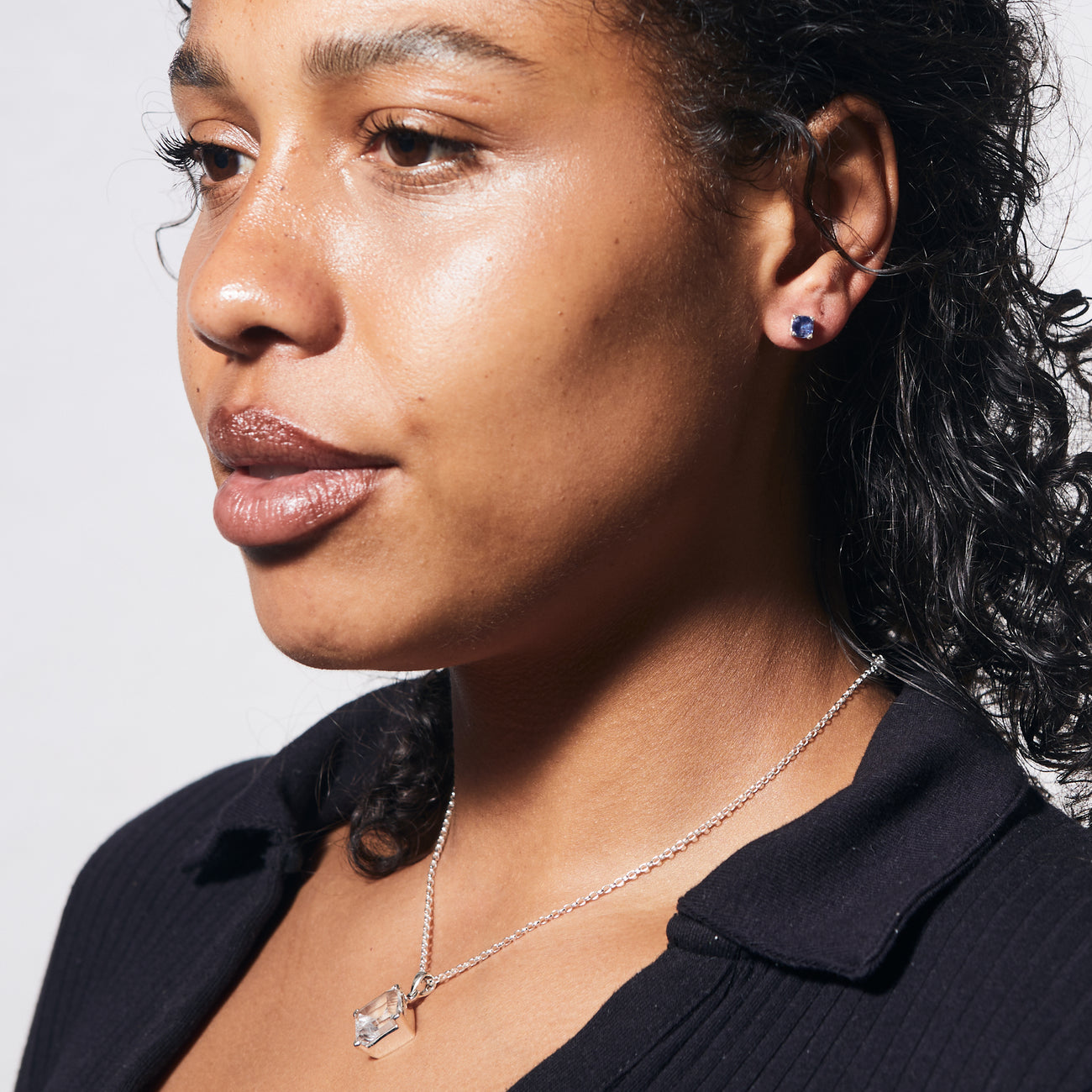 FACETED BLUE KYANITE ROUND STUD DROPS STERLING SILVER ON MODEL| MADE IN EARTH