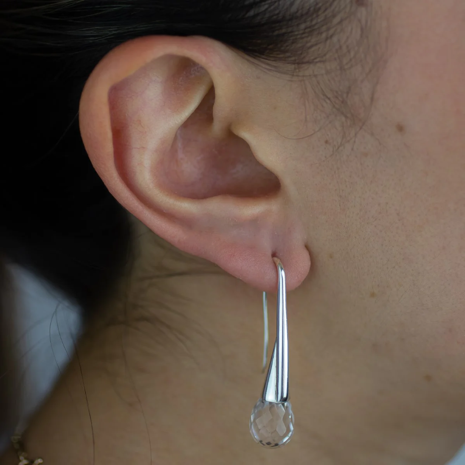 FACETED BRIOLETTE CLEAR QUARTZ DROP EARRINGS ON MODEL | MADE IN EARTH