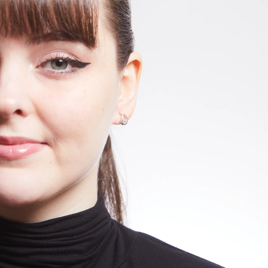FACETED ROUND CLEAR QUARTZ IN TEAR BEZEL STUD EARRINGS STERLING SILVER ON MODEL | MADE IN EARTH