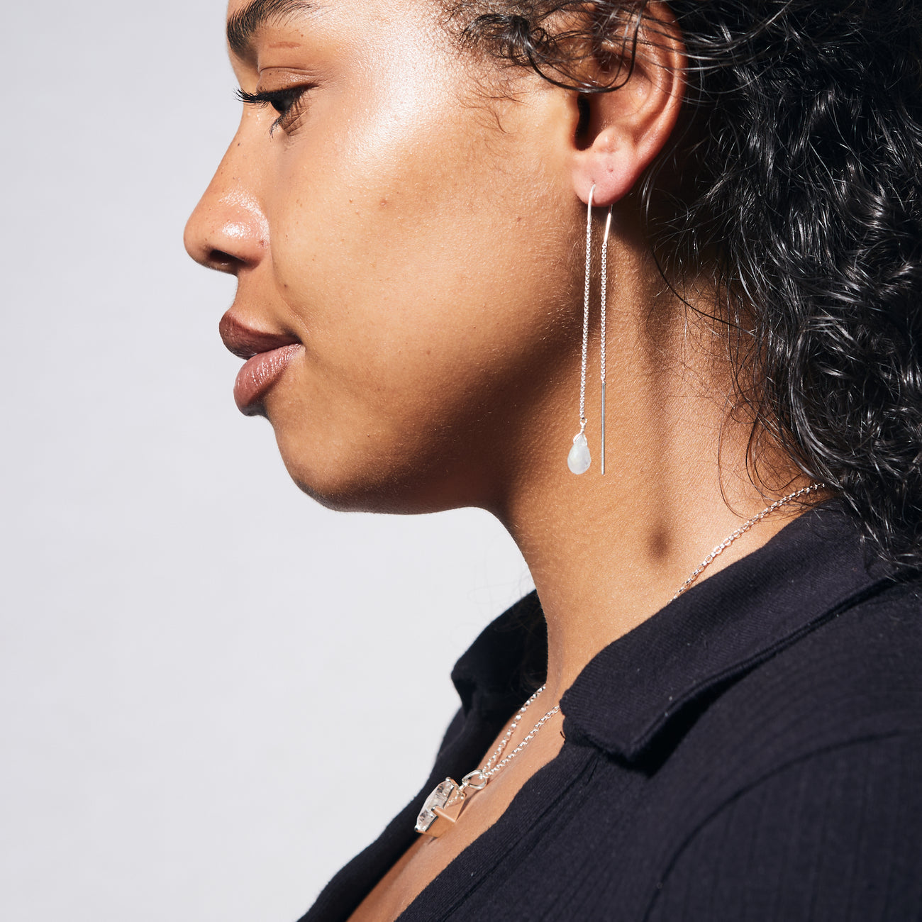 faceted briolette rainbow moonstone earrings on model