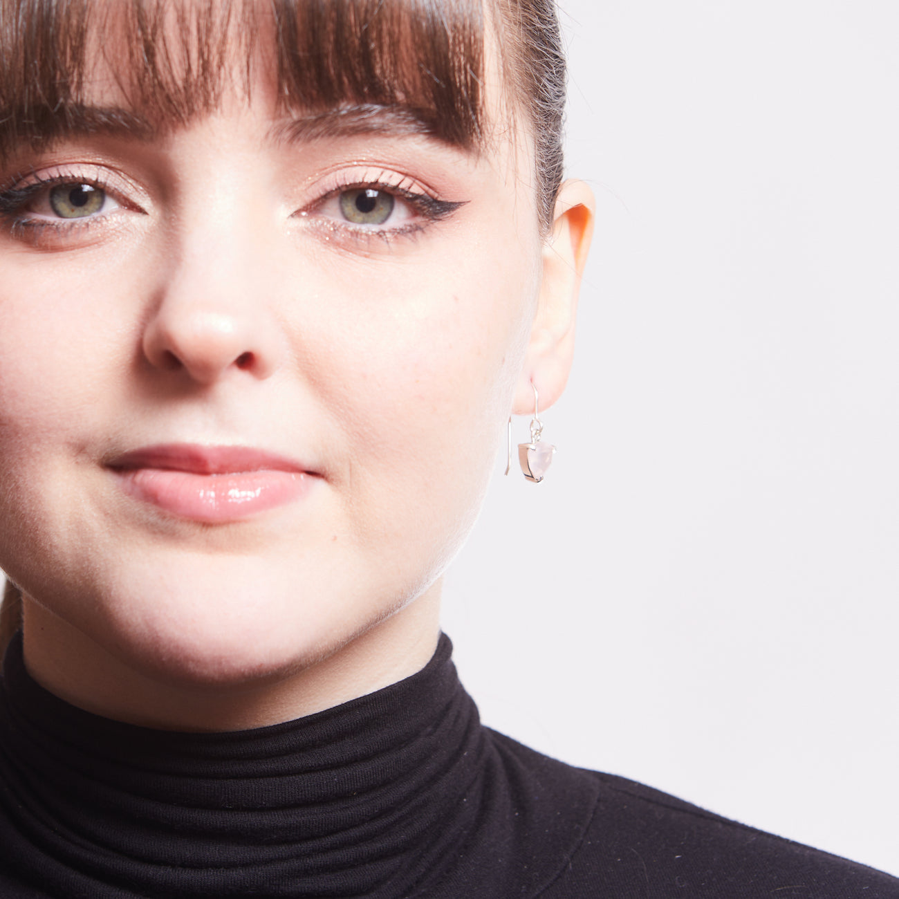 TRILLION FACET ROSE QUARTZ DROP EARRINGS STERLING SILVER ON MODEL | MADE IN EARTH