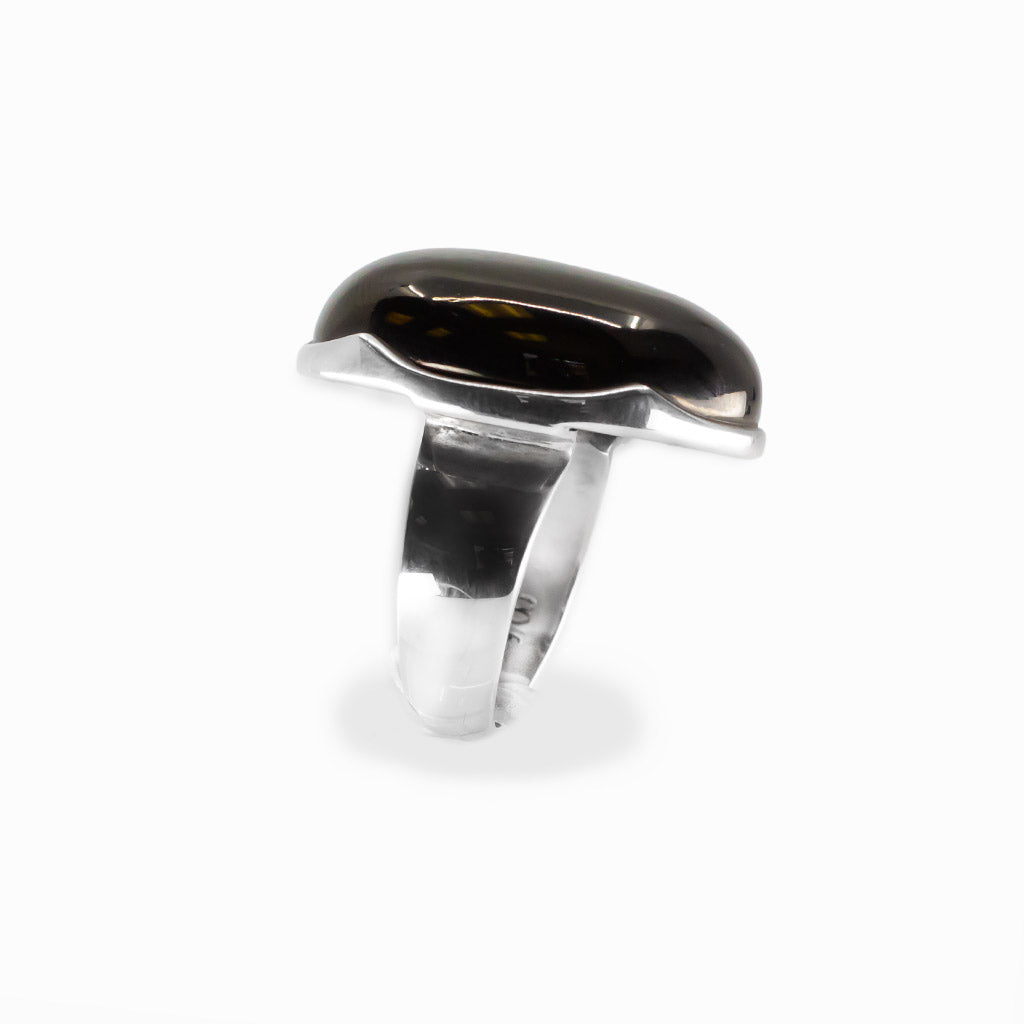 Jet oval cabochon ring in polished sterling silver featuring a smooth high-polish surface and rich glossy black coloring.