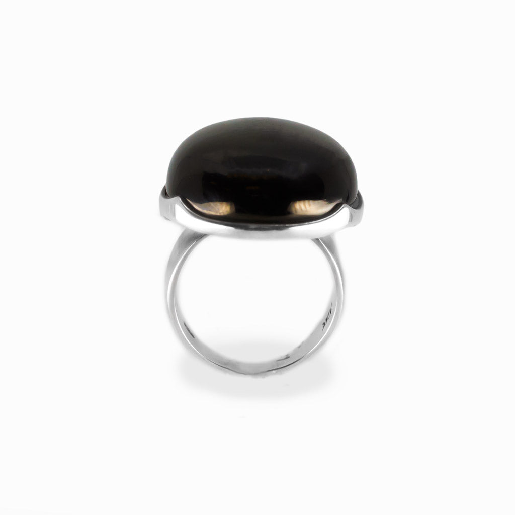 Jet oval cabochon ring in polished sterling silver featuring a smooth high-polish surface and rich glossy black coloring.
