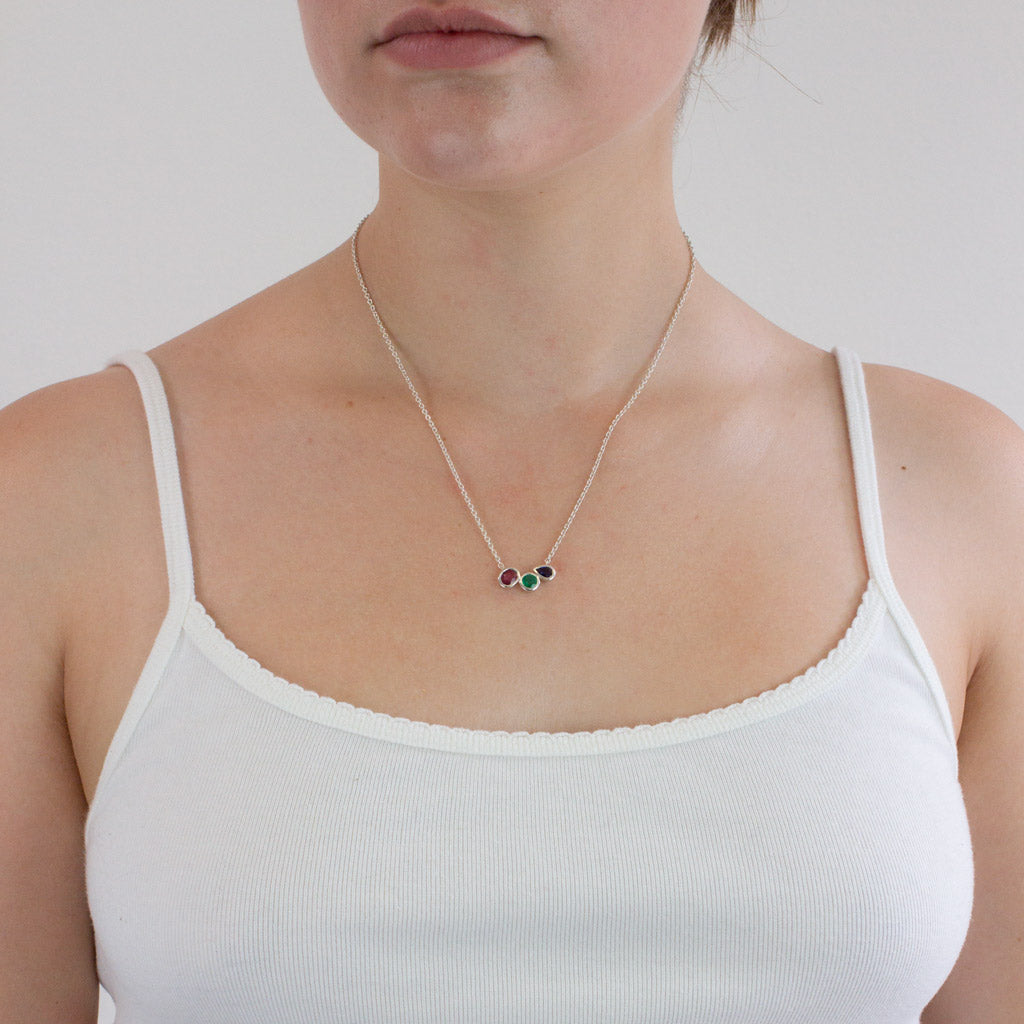 Sapphire, Emerald, & Ruby Necklace on model