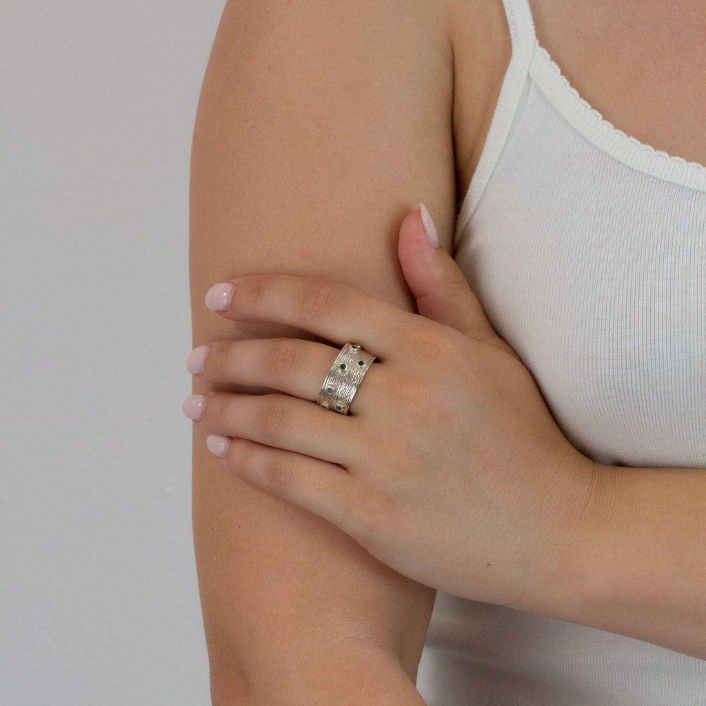 Green Emerald ring on model