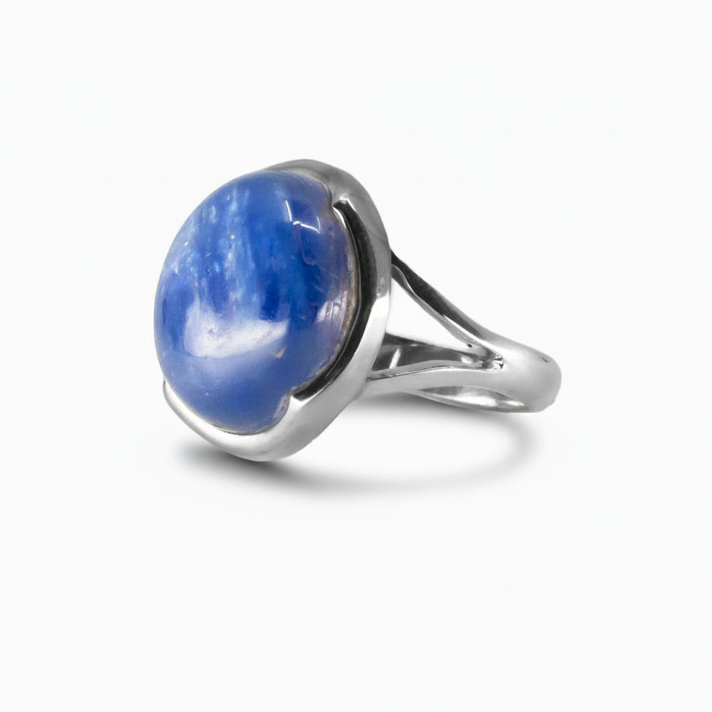 Round Kyanite cabochon ring in sterling silver featuring blue and white crystalline patterns. | MADE IN EARTH