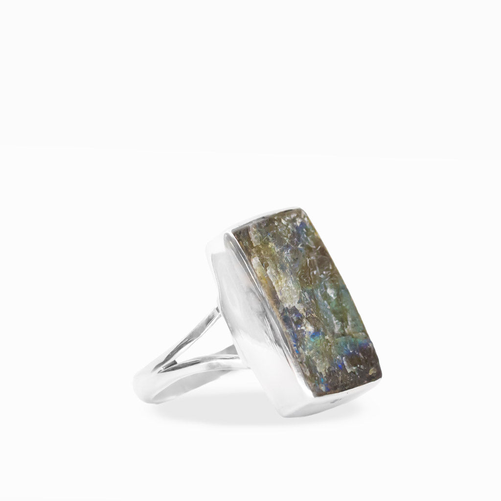 Rectangular Labradorite ring with earthy gray, gold, and blue-green flashes, polished sterling silver bezel setting, and split band.