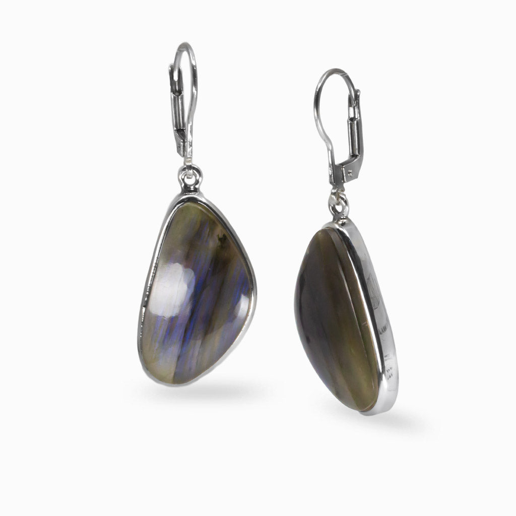 Organic-shaped Labradorite drop earrings in sterling silver showing iridescent blue and grey tones.| MADE IN EARTH