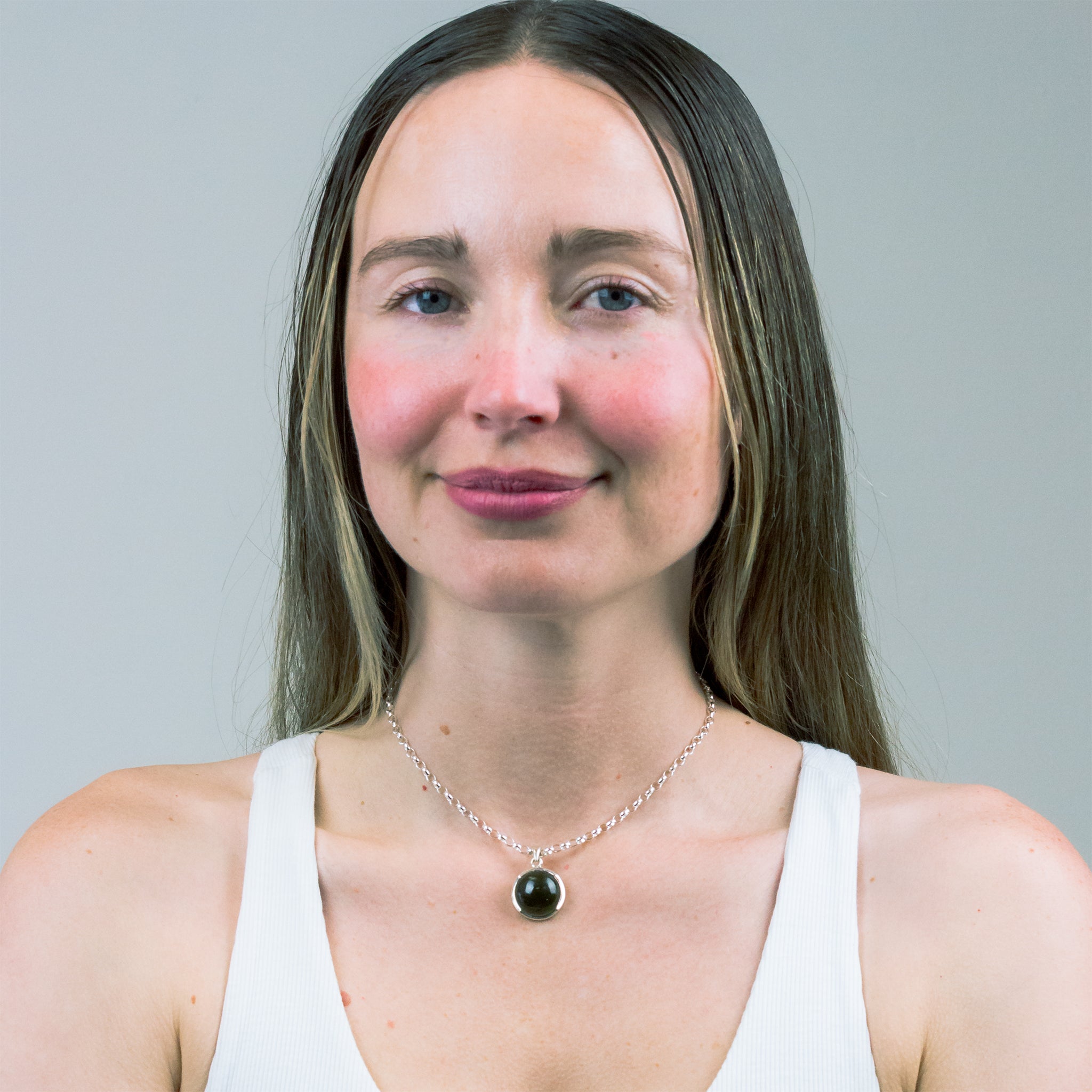 CABOCHON ROUND MOLDAVITE NECKLACE STERLING SILVER ON MODEL | MADE IN EARTH