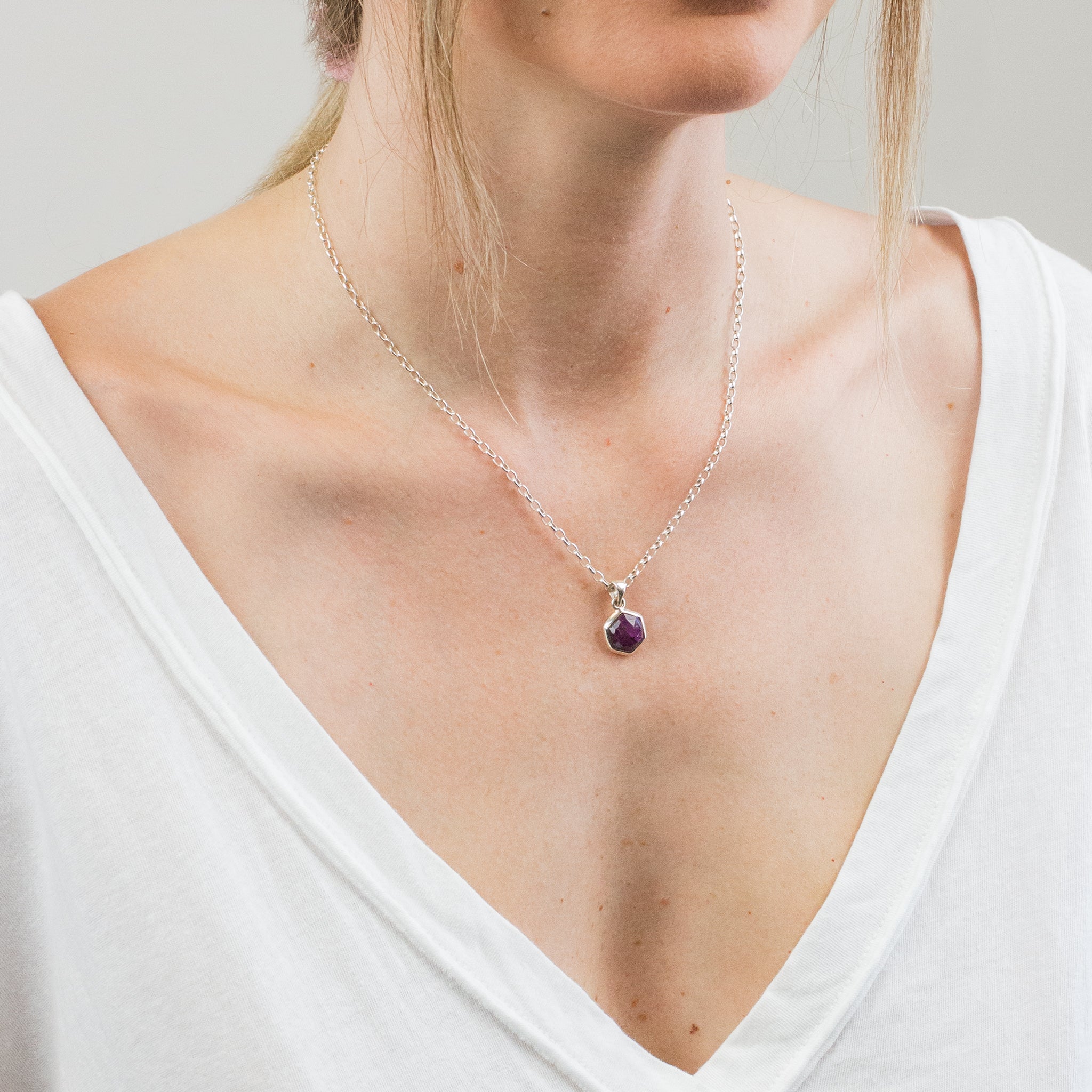 FACETED HEXAGON NECKLACE ON MODEL