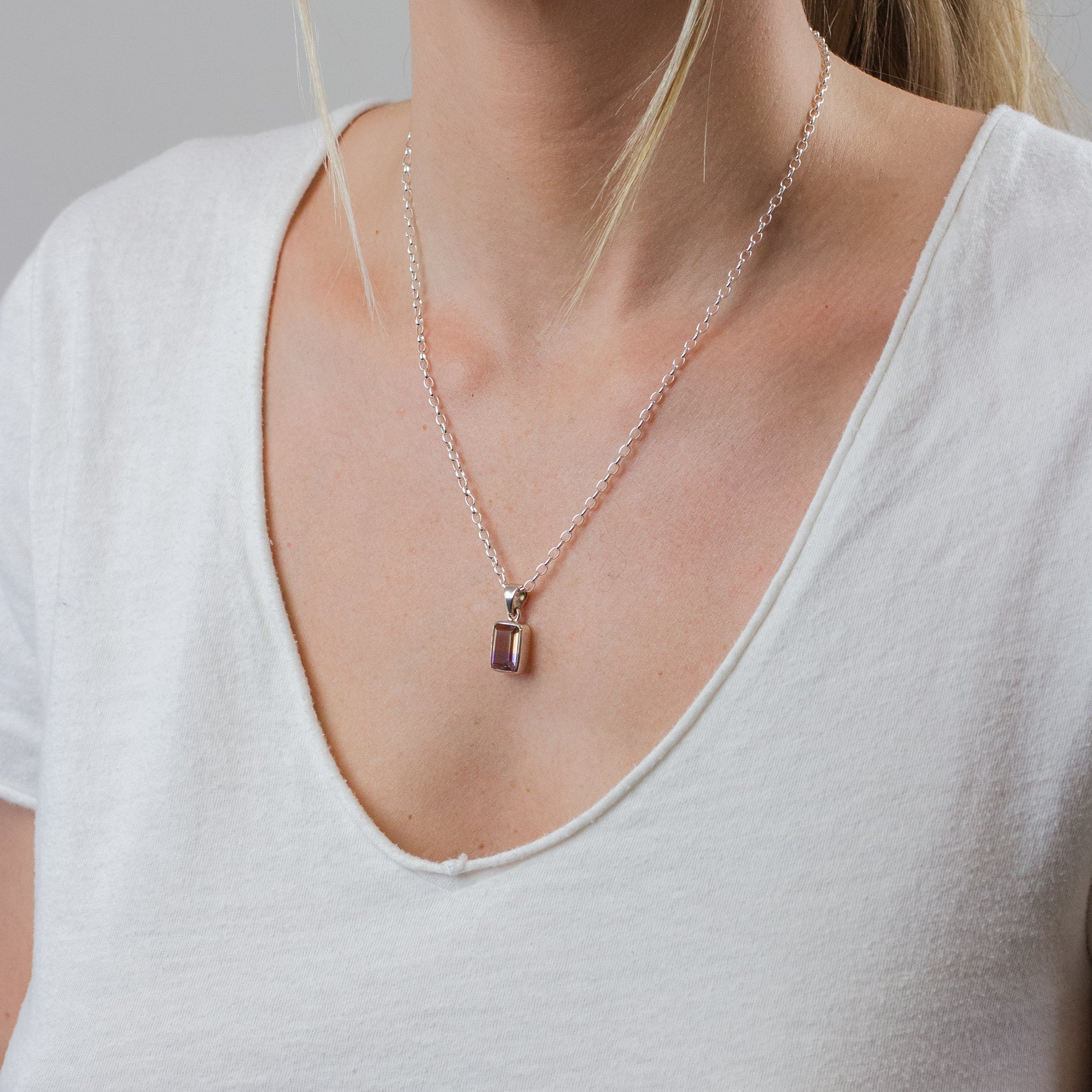 FACETED AMETRINE NECKLACE ON MODEL