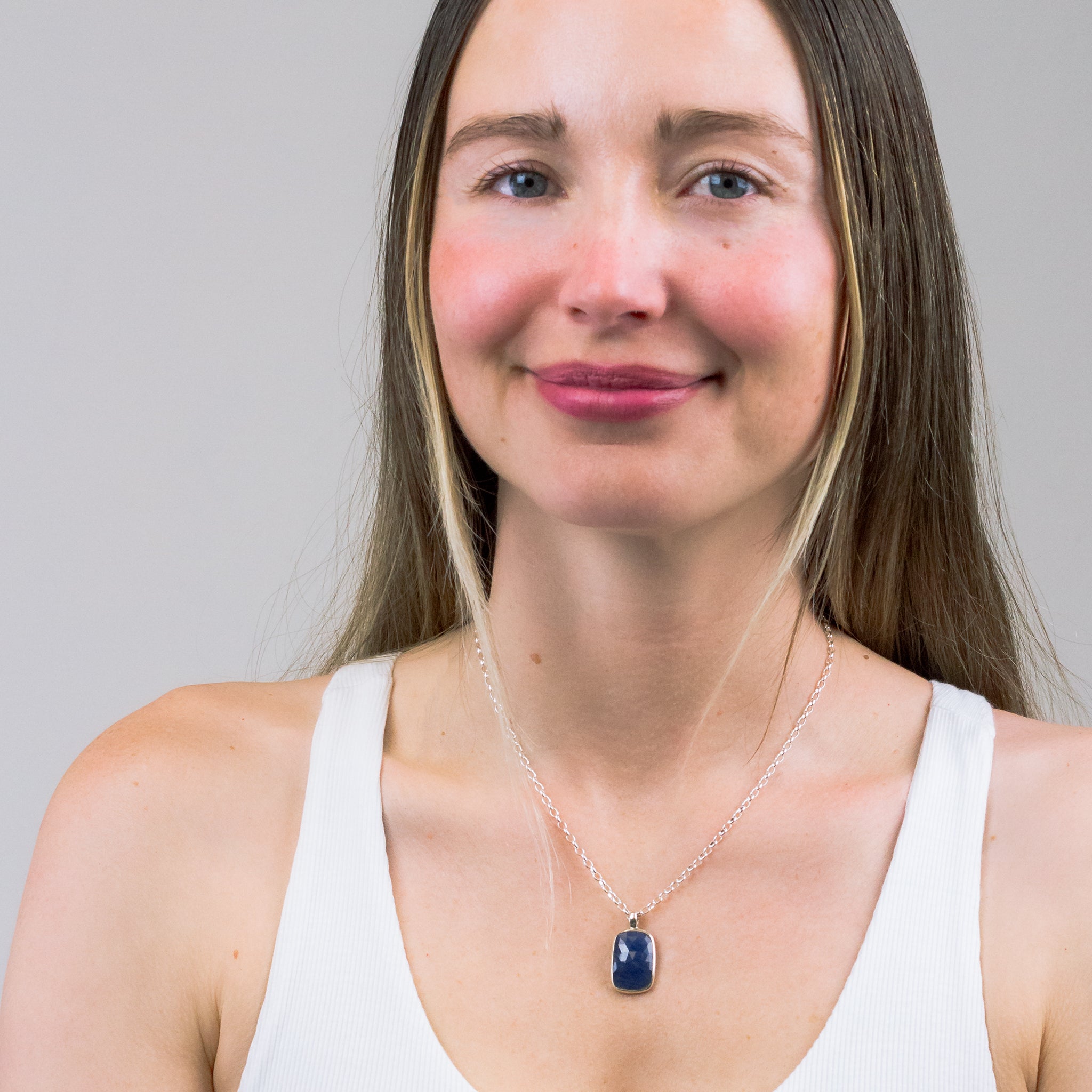 FACETED SAPPHIRE NECKLACE ON MODEL