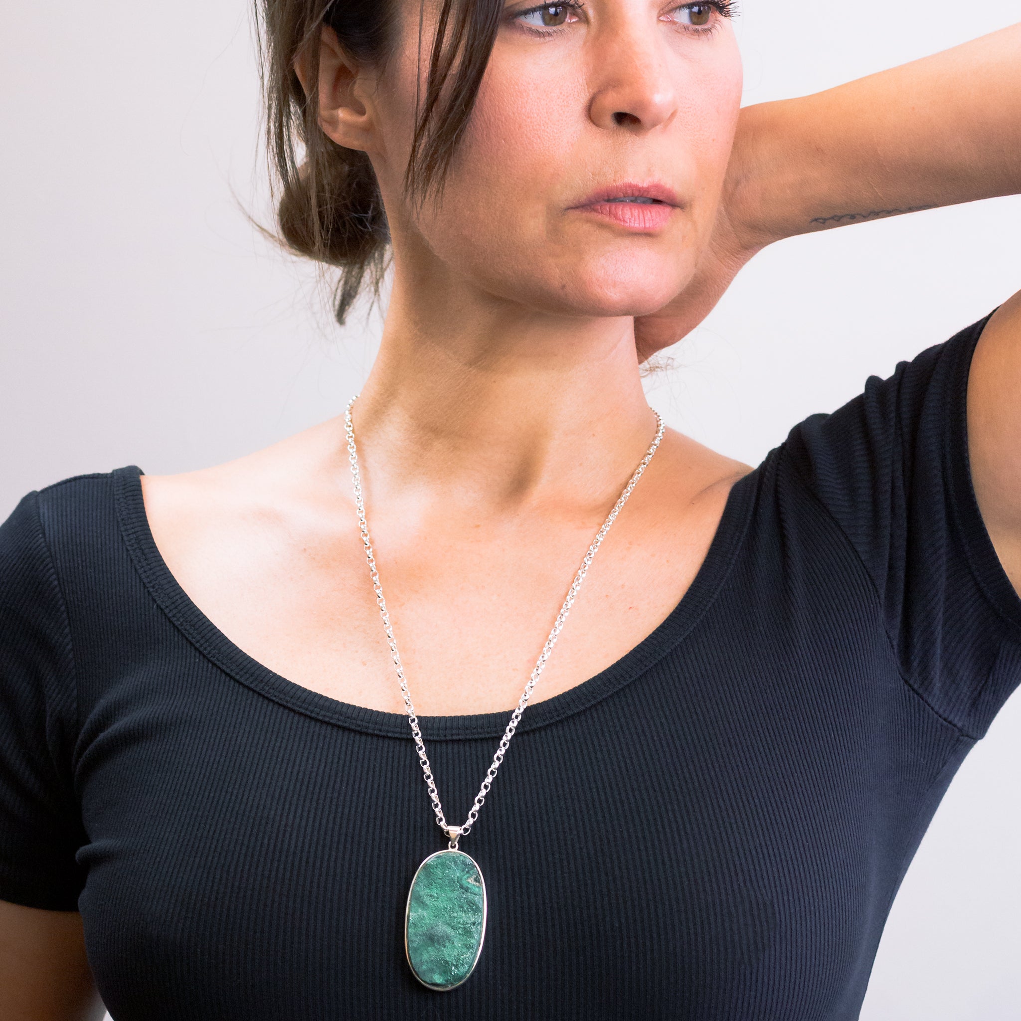 FIBROUS MALACHITE NECKLACE ON MODEL