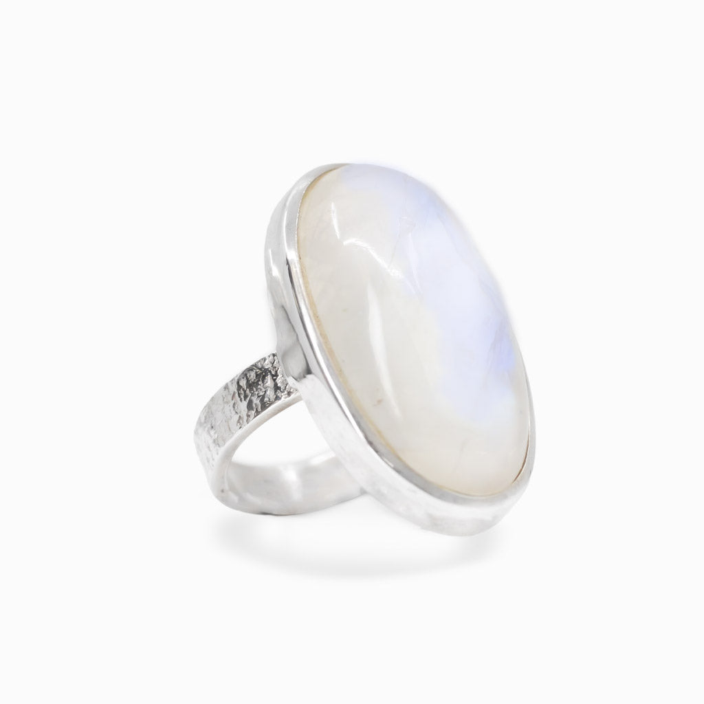 Oval Rainbow Moonstone cabochon sterling silver statement ring with blue iridescence.
