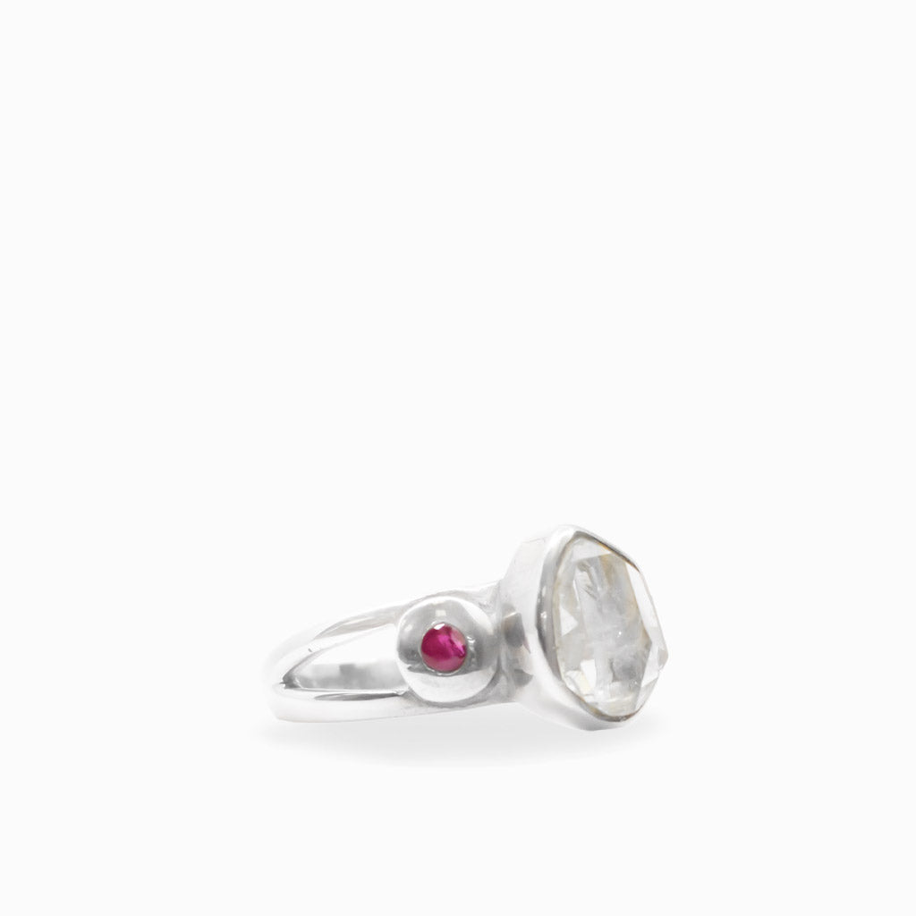 Natural Herkimer Diamond and round Ruby ring in polished 925 sterling silver with an asymmetrical two-stone setting.