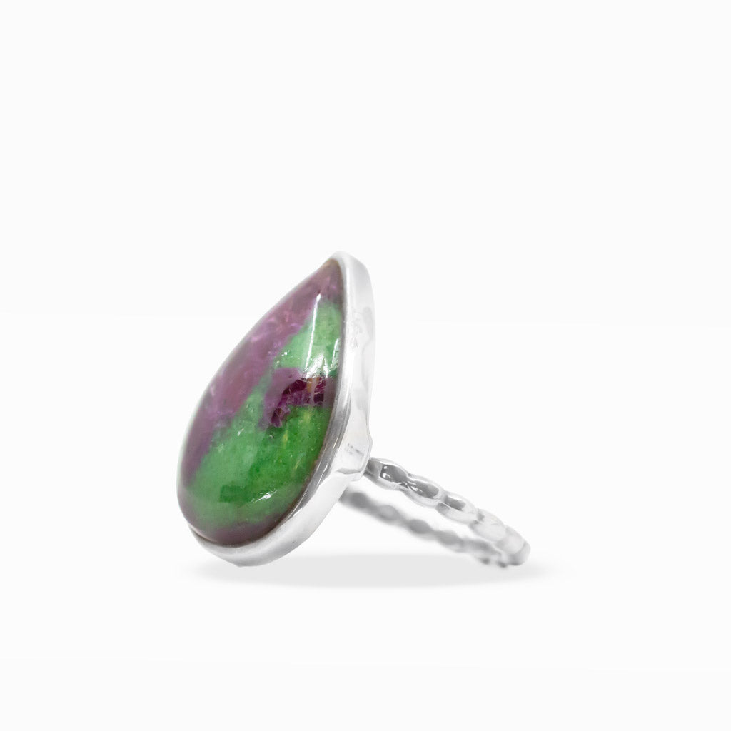 Pear-shaped Ruby Zoisite ring with vivid green Zoisite and deep purple-red Ruby inclusions in polished sterling silver bezel setting.