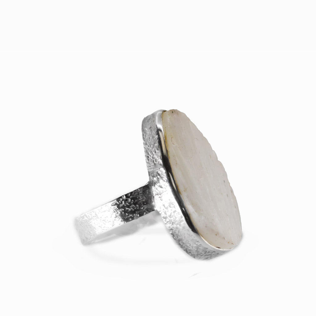 Teardrop Scolecite cabochon sterling silver statement ring with silky natural fibers.