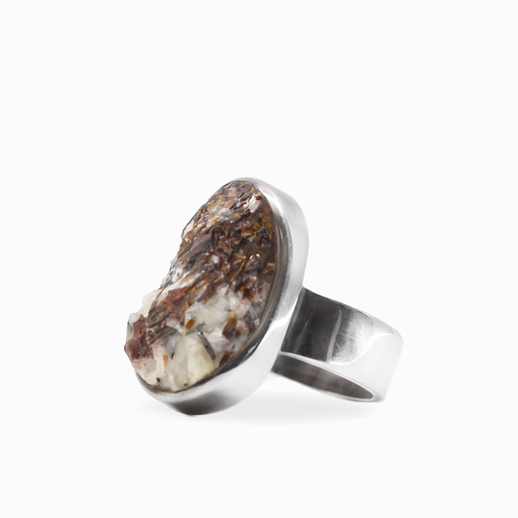 Freeform oval Astrophyllite ring with bronze, cream and metallic formations set in polished 925 sterling silver.