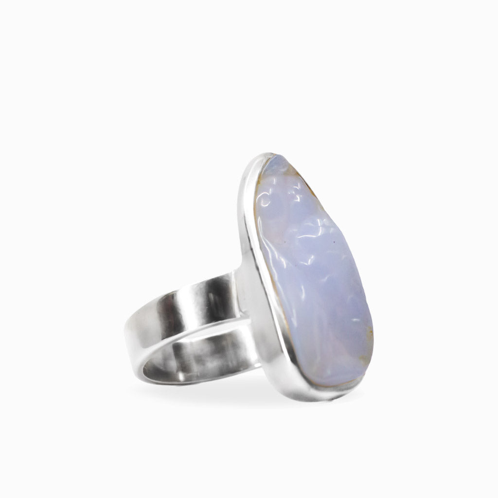 Elongated freeform blue-lavender Botryoidal Chalcedony ring in a polished 925 sterling silver bezel setting.