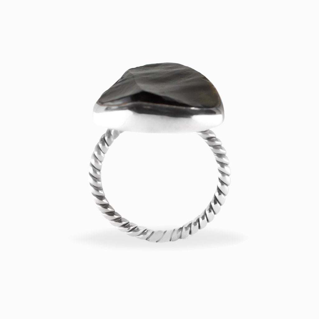 Freeform triangular Apache Obsidian ring in polished 925 sterling silver with a smooth bezel setting.