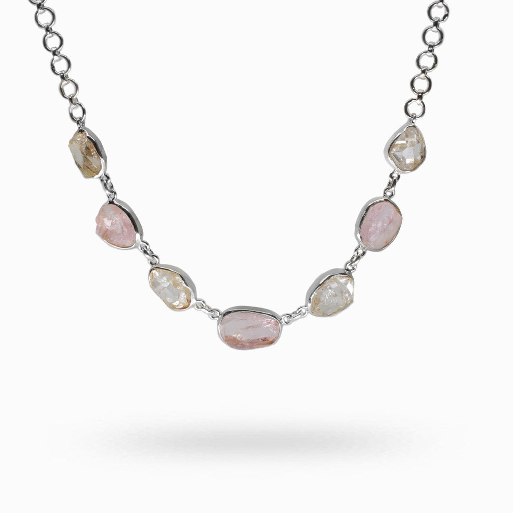Raw pink Morganite and clear Herkimer Diamond stones set in sterling silver bezels along a silver chain multistone necklace MADE IN EARTH