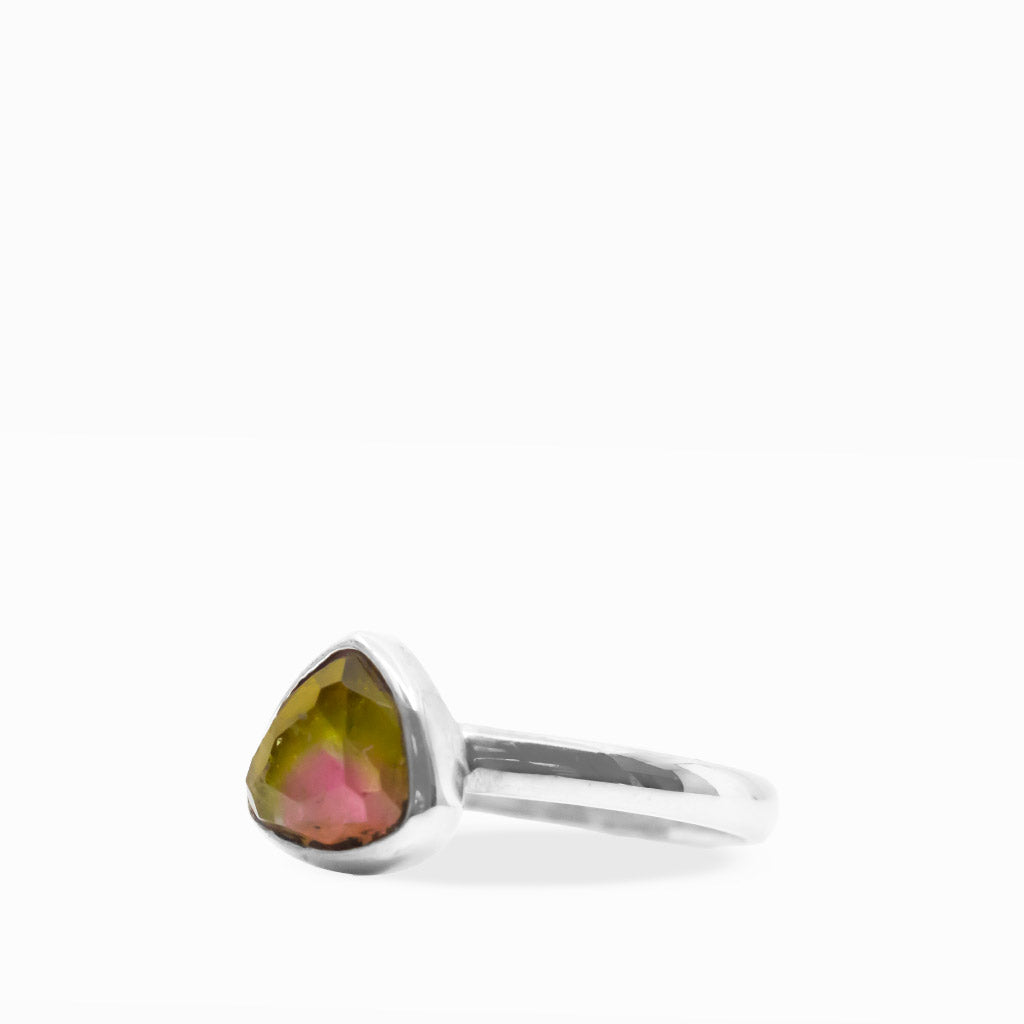 Triangular Watermelon Tourmaline ring with translucent golden-green and pink color zoning, polished sterling silver bezel, and smooth band.