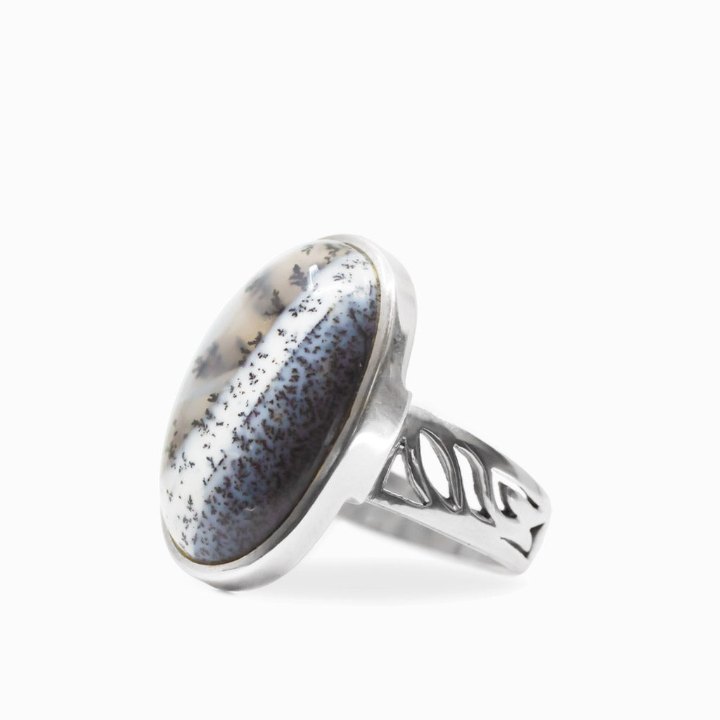 Oval Dendritic Opal cabochon with black branch-like inclusions set in polished 925 sterling silver.