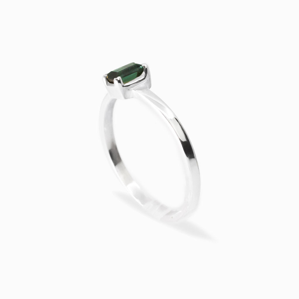 Elongated rectangular faceted Green Tourmaline ring in polished 925 sterling silver with a four-prong setting.
