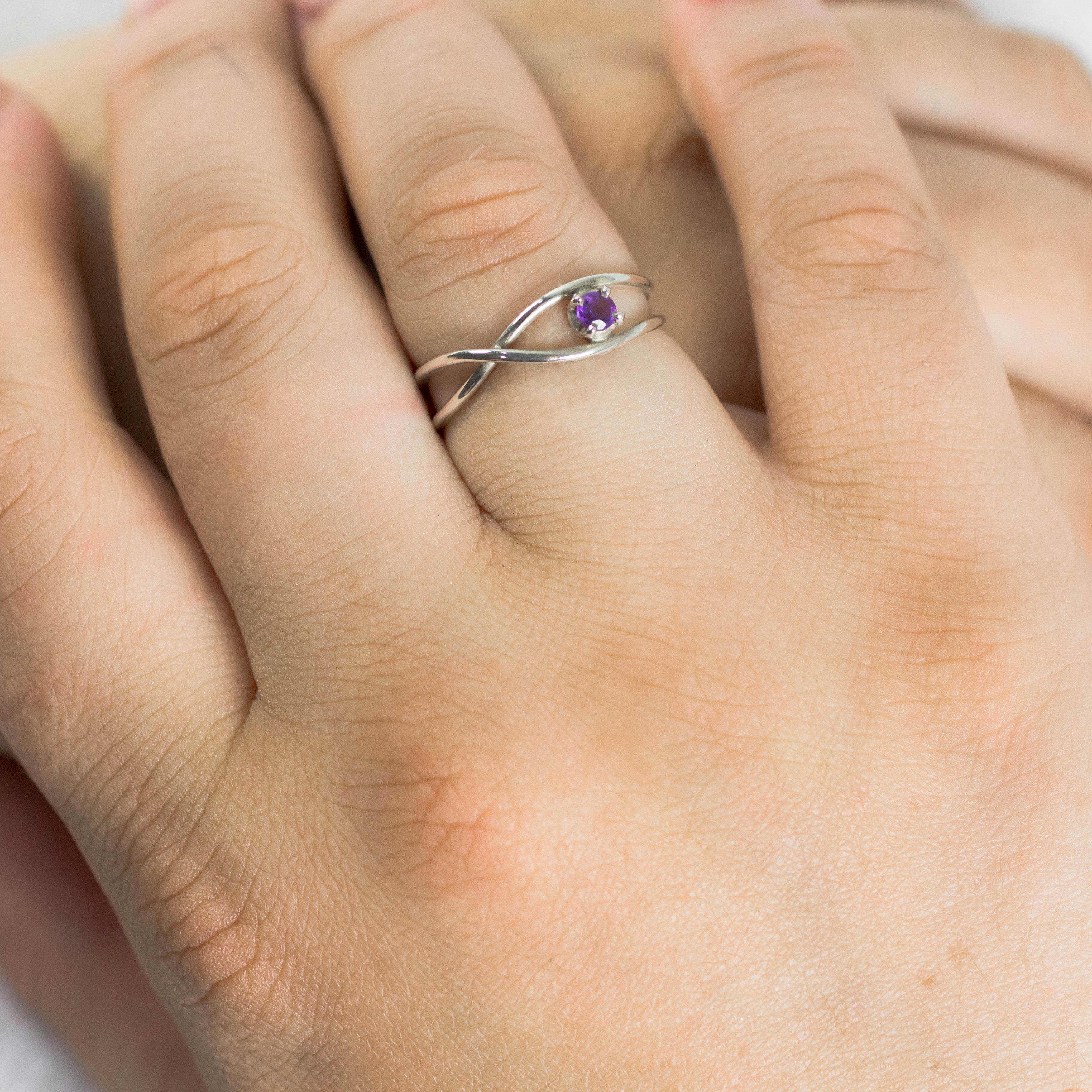 Faceted amethyst birthstone ring