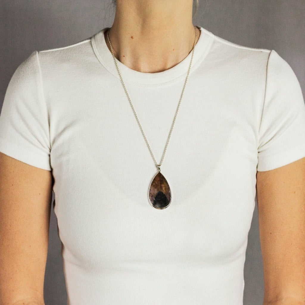 PURPLE BROWN CAB TEARDROP STERLING SILVER CACOXENITE NECKLACE ON MODEL