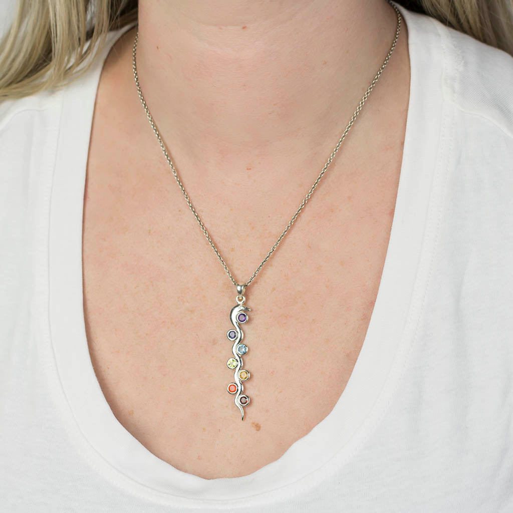 ROUND PURPLE VIOLET BLUE GREEN YELLOW ORANGE RED FACETED STERLING SILVER ORGANIC SHAPE AMETHYST IOLITE BLUE TOPAZ PERIDOT CITRINE CARNELIAN GARNET (CHAKRA) NECKLACE ON MODEL