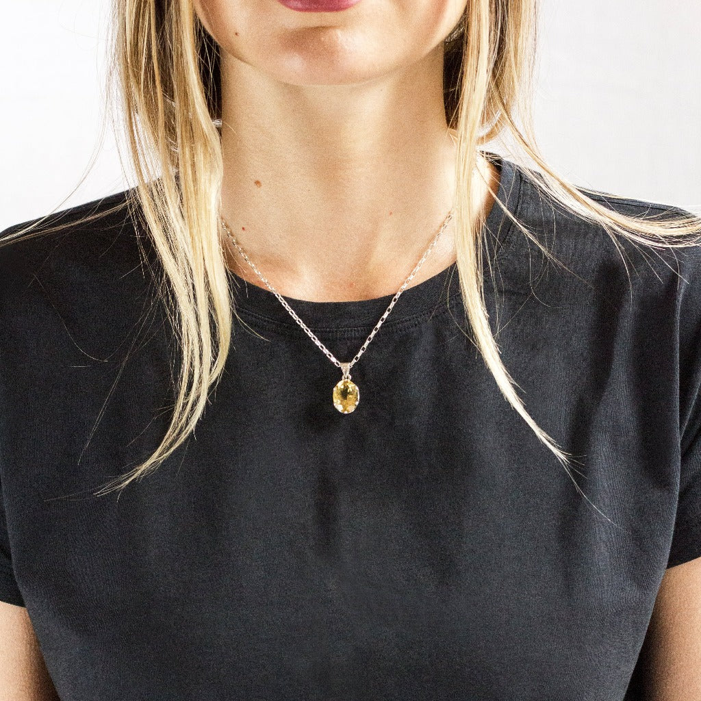Oval Faceted Citrine Necklace with bezel claw on Model Made In Earth