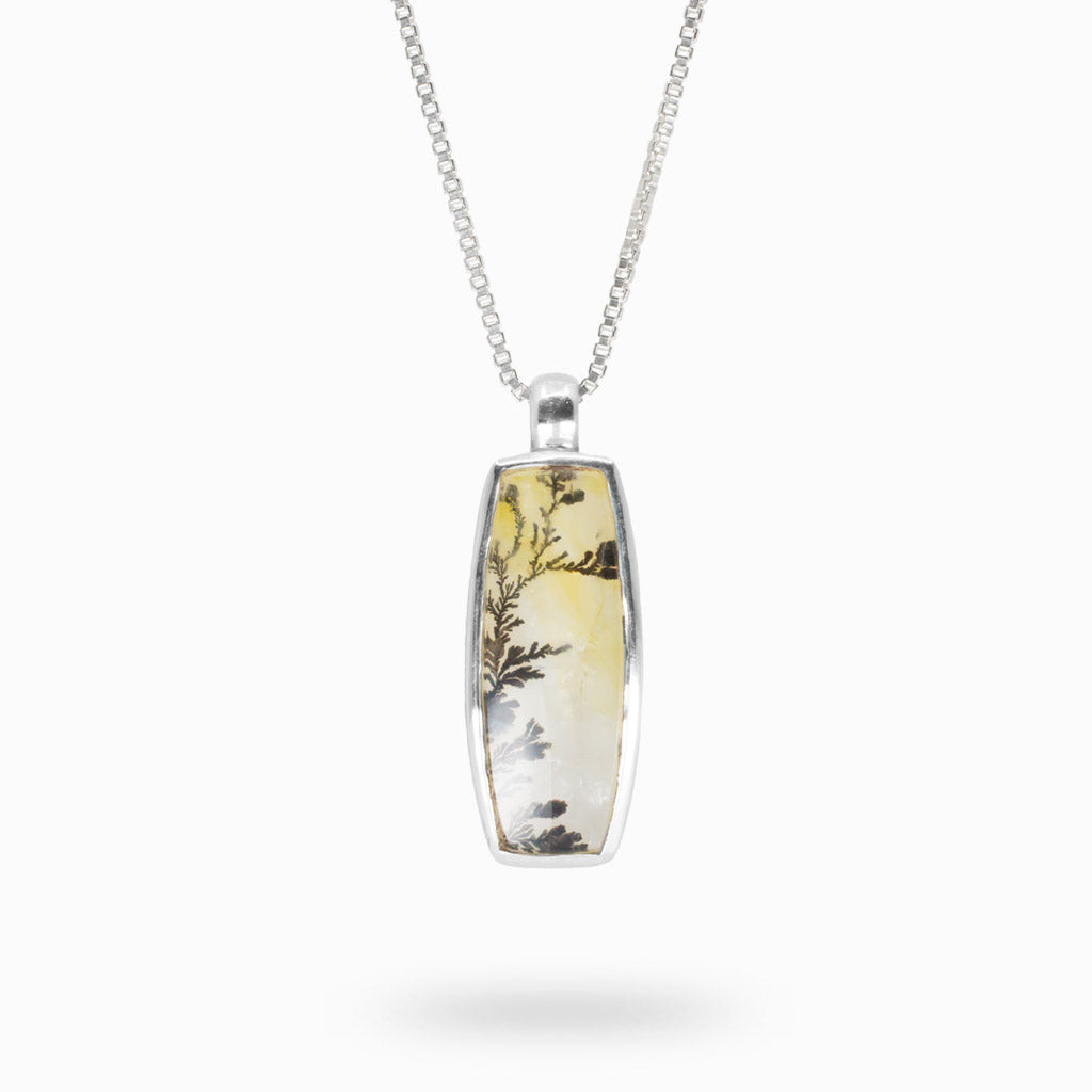 Rounded vertical rectangle yellow with dendritic fern like black structures Dendritic Quartz necklace made in earth