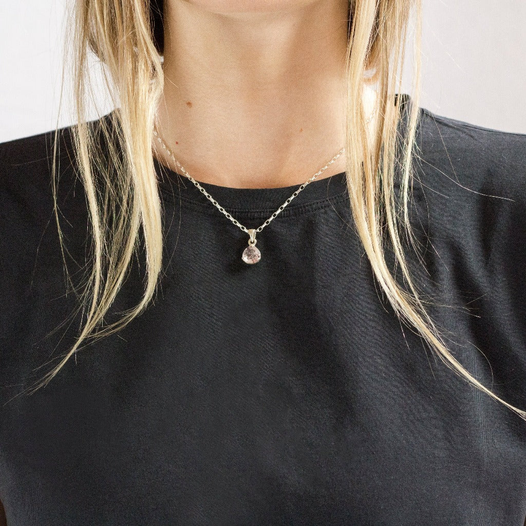 Faceted tear Red splashed in clear Lepidocrocite Necklace on model