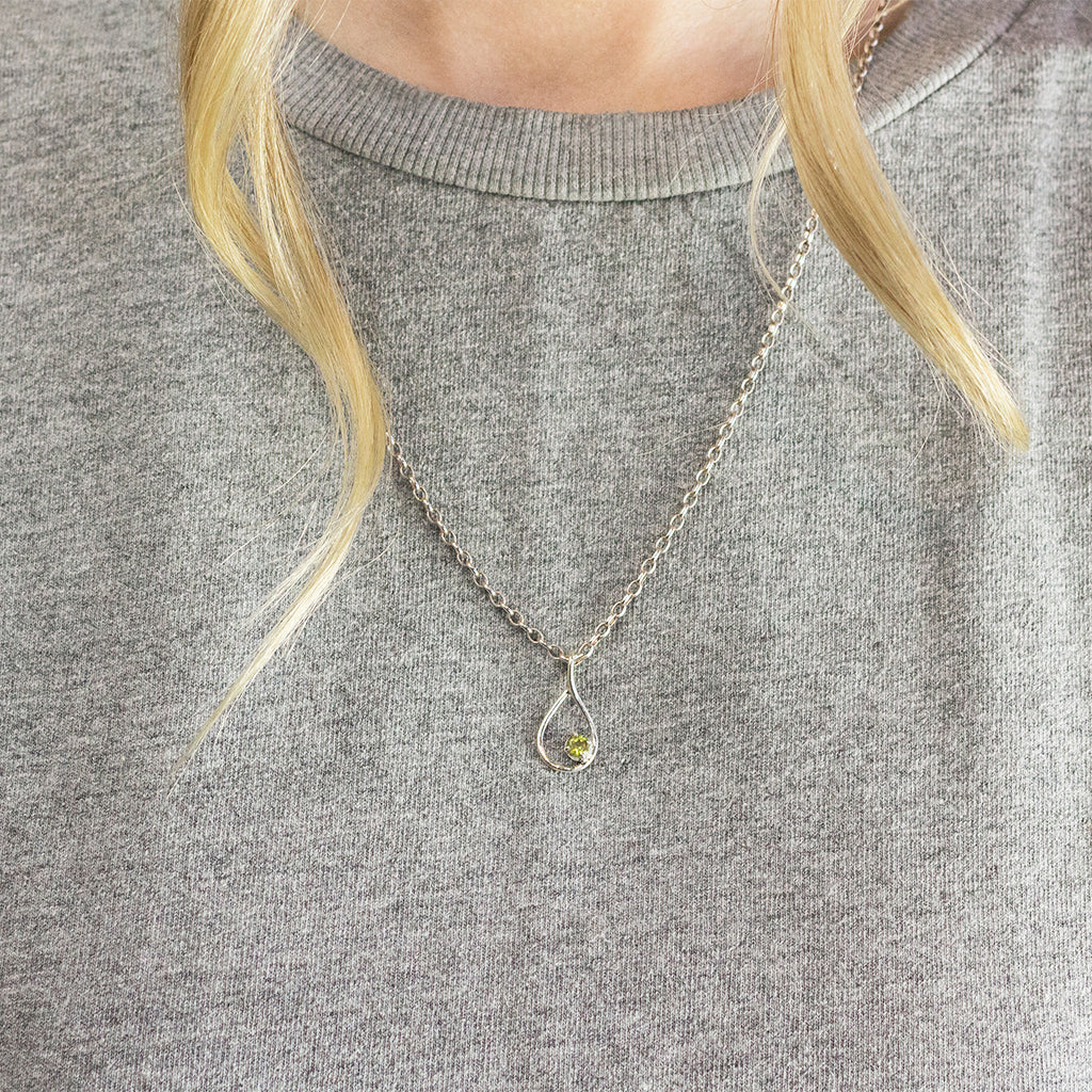 Model Wearing AUgust birthstone Peridot necklace Made in earth