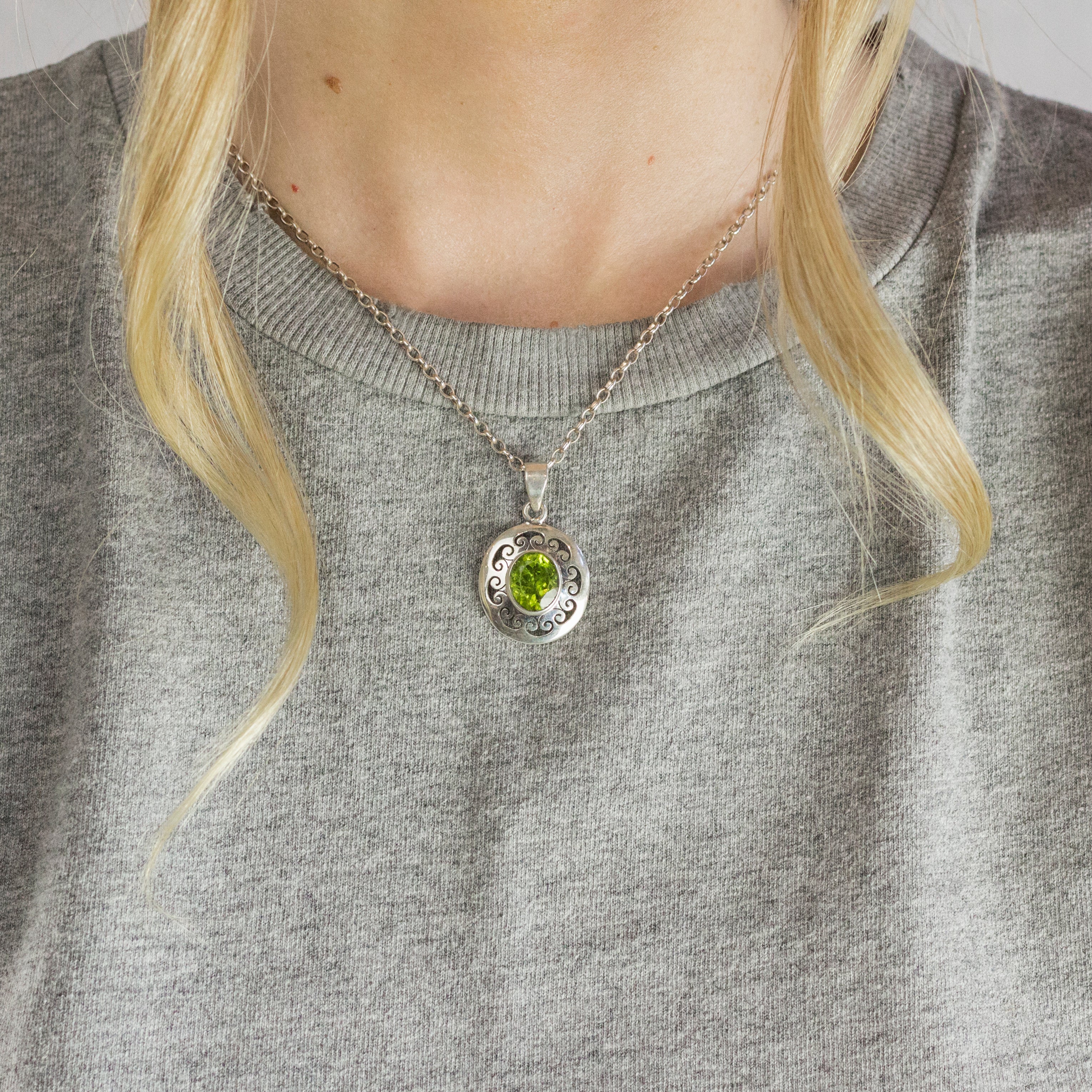 Model Wearing Faceted Peridot necklace with Filigree Made In Earth